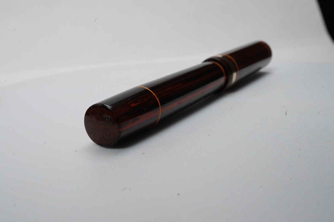 A Conklin Endura woodgrain lever filler fountain pen in near mint condition